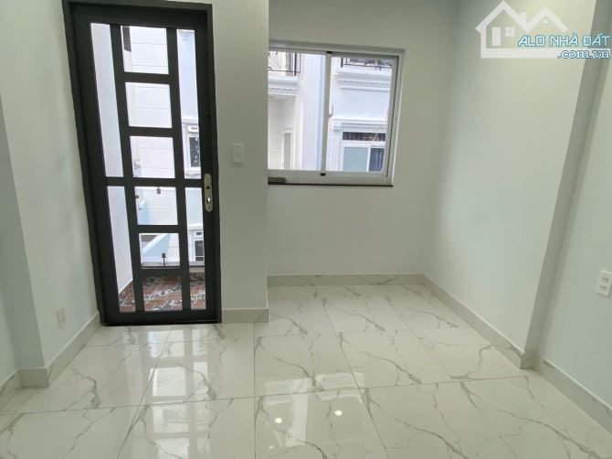 Bán nhà Quận 10-CMT8 giá 7,8 T.ỷ 4 tầng 6 phòng ngủ xe hơi tới gần nhà - 2