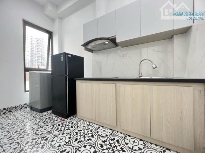 Bán Toà Nhà Căn Hộ 9 Tầng Ô Tô KD 250Tr/Th Hoàng Cầu Đống Đa DT 109M MT 6.2M Giá 44Tỷ - 8