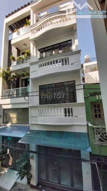 Mặt Tiền Triệu Quang Phục Nguyễn Trãi Q5 ( 4 * 14 ) 4 Lầu 18.5 Tỷ