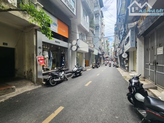 BÁN NHÀ MẶT PHỐ ĐÔNG CÁC ĐỐNG ĐA 32 TỶ DT 90M2 MT 4.5M 8T THANG MÁY LÔ GÓC 3 MẶT THOÁNG.