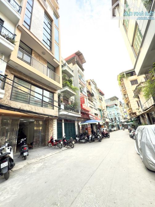 BÁN NHÀ MẶT PHỐ  THỊNH QUANG ĐỐNG ĐA 38 TỶ DT 100M2 MT 6M  9T VỈA HÈ Ô TÔ TRÁNH KINH DOANH - 1