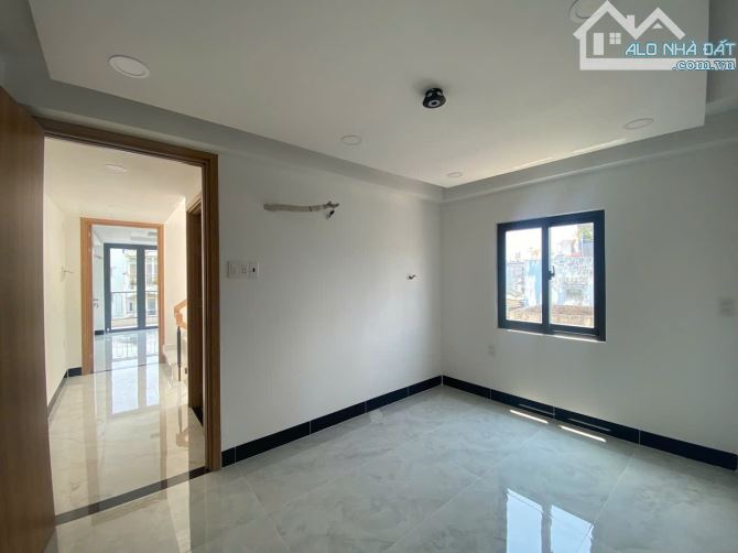 Bán nhà 4 tầng MT Lê Quang Định –Nơ Trang Long, DTSD 200m2, 16 tỷ - 5