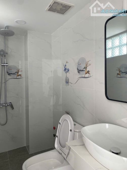 Bán nhà 4 tầng MT Lê Quang Định –Nơ Trang Long, DTSD 200m2, 16 tỷ - 6