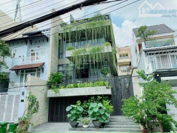 Siêu hiếm - biệt thự đường Trường Sơn - DT: 7.5 x 20m - hầm 3 tầng - giá 43 tỷ.