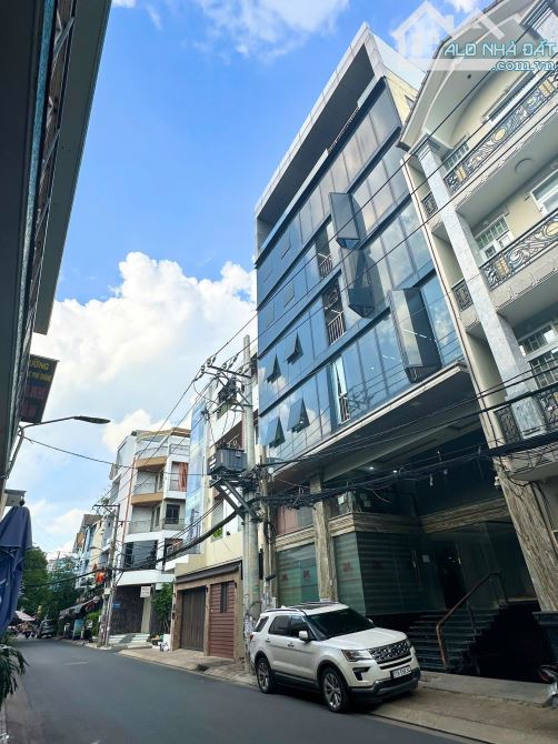 Tòa nhà văn phòng - Hầm 7 tầng , DT: 12m x 18m , Nguyễn Cửu Đàm Q.TP , Giá chỉ 46 tỷ - 1