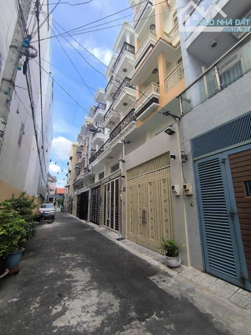 Bán Nhà Hẻm 102 Lê Văn Thọ P11. DT: 4X17( Nở Hậu 5.7m). Nhà 1 Trệt 2 Lầu GIÁ CHỈ 9.2 TỶ TL - 4