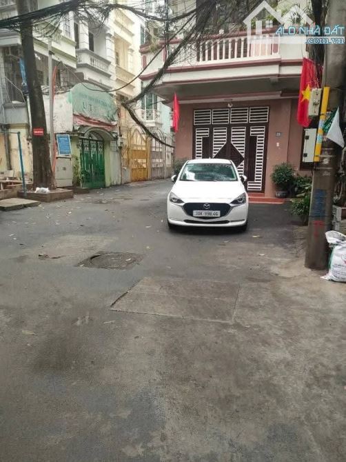 NHÀ ĐẸP - MỚI NGÃ TƯ SỞ. THOÁNG TRƯỚC SAU, Ô TÔ NGỦ TRONG NHÀ. 6 TẦNG - THANG MÁY. 65 M2.