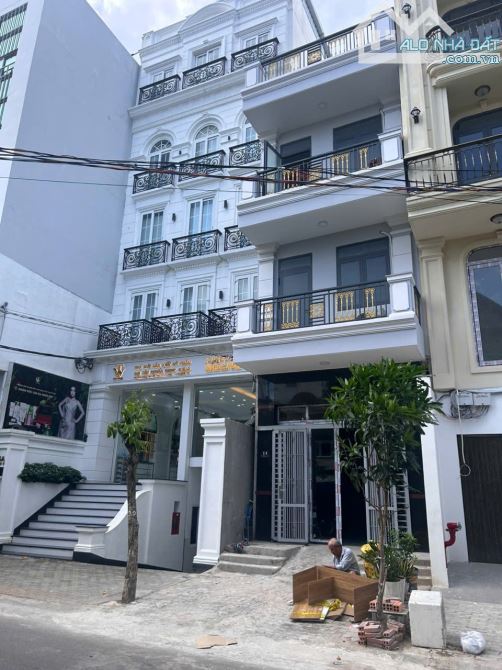 Cần bán gấp căn nhà MT Đường số Lâm Văn Bền, 90m2, 3 lầu, giá 15 tỷ sổ hồng