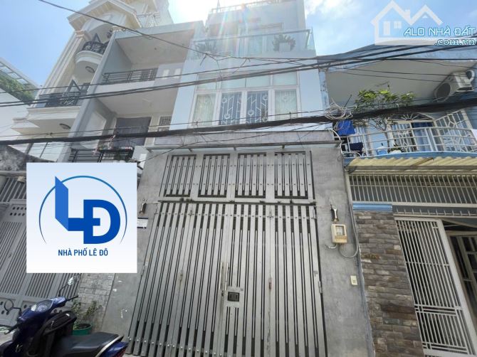 Nhà bán.Vị trí đẹp.Có thang máy.Dt 60 m2.4 tầng.Phan Huy Ích.Quận Tân Bình.Giá tốt - 8