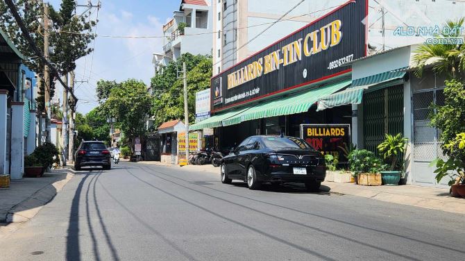 TOÀ NHÀ VĂN PHÒNG 7 TẦNG THANG MÁY - 129m2 (5×26) - KHU CV LÀNG HOA - 18.5 TỶ