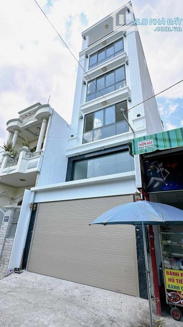TOÀ NHÀ VĂN PHÒNG 7 TẦNG THANG MÁY - 129m2 (5×26) - KHU CV LÀNG HOA - 18.5 TỶ - 10