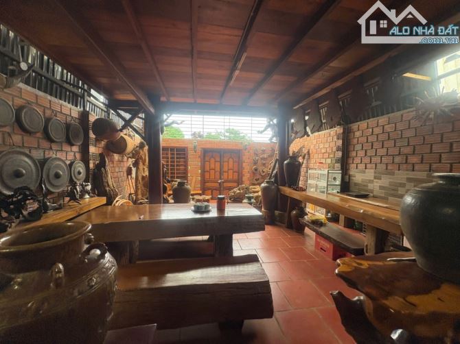 nhà mặt tiền kinh doanh kèm nhà gỗ sang trọng 2 tầng - 1