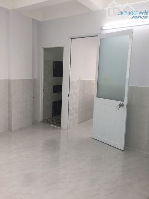 Bán nhà mới 4 tầng BTCT xe hơi dừng trước cửa Trường Sa, DT 42m2, 7.1 tỷ TL - 1