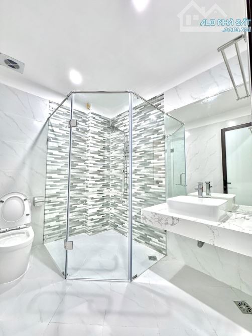BÁN NHÀ ĐƯỜNG ĐỊNH CÔNG THƯỢNG. GARA Ô TÔ. NHÀ MỚI. THANG MÁY. 60M2 - 7 TẦNG. - 15