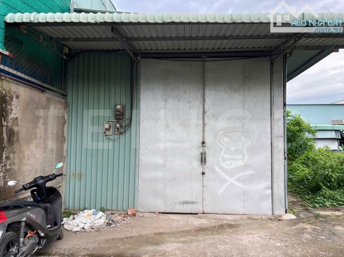 Kho xưởng bãi 140m² kho xây dựng 110m² có điện 3 pha, đường cặp Quốc Lộ 1A