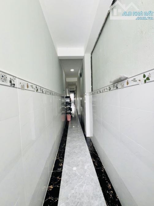 Bán CHDV HXh Dương Quảng Hàm - 5 tầng- 135m2- 16 phòng cho thuê khoán gần 60tr/ tháng. - 3