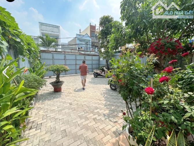 Villa hơn 1000 m2 mặt tiền đường 12m Đông Hưng Thuận , Quận 12 , giá 33tr/m2. - 5