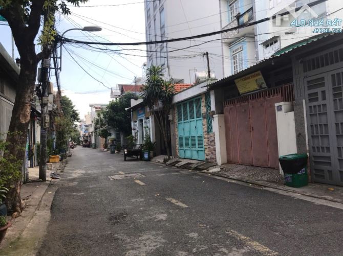 NHÀ MẶT TIỀN 3 TẦNG. VỊ TRÍ ĐẸP CÓ SẴN DÒNG TIỀN TRUNG MỸ TÂY 1. SHR FULL THÔ