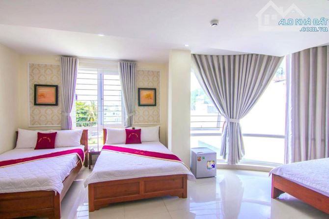 Bán khách sạn mặt tiền 1T5L 1hầm Trần Đại Nghĩa giá 13.5ty - 2