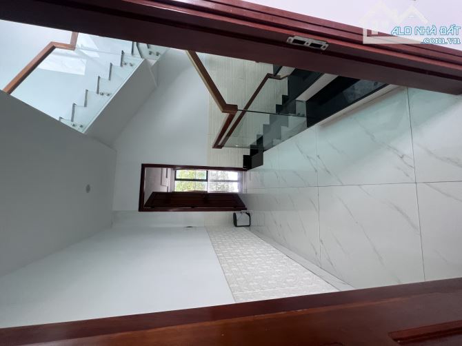 Nhà 4 tầng mặt tiền Nguyễn Tất Thành - 5