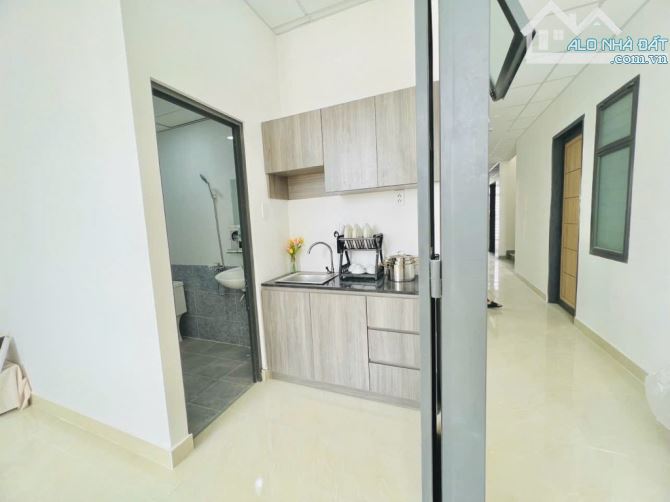 Bán Căn Hộ Dịch Vụ Mặt Tiền khu Lê Văn Quới, 232m2, 6 Tầng, 28 phòng, thu nhập 120 triêụ - 6