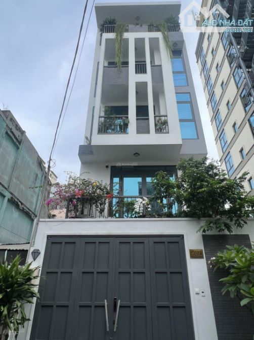 DÒNG TIỀN 70tr/tháng - SÁT BÊN HUTECH- XVNT - UNG VĂN KHIÊM - 68m2- 6 TẦNG -11 CHDV FULL