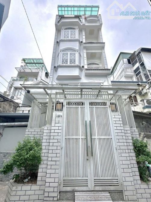 Bán gấp nhà trung tâm P. Nhuận cạnh Huỳnh Văn Bánh hẻm 4m5 1truc 5tầng gần 300m2 nhỉn 7tỉ - 1