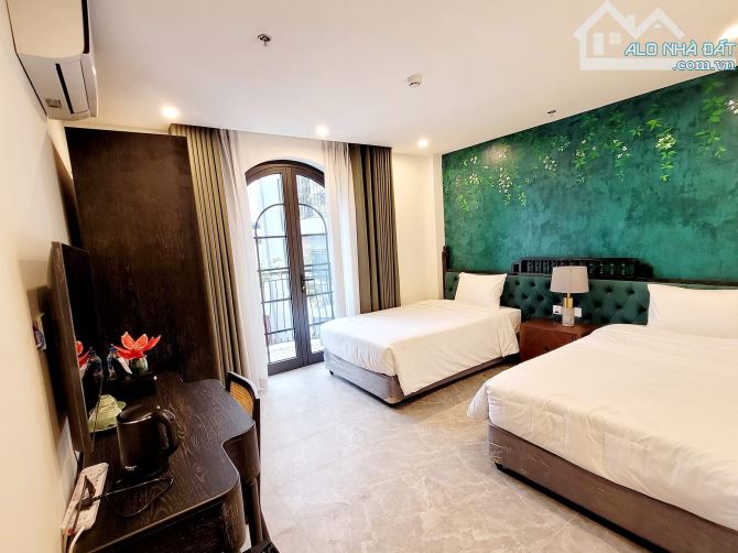 BÁN KHÁCH SẠN GIANG VĂN MINH 290m2 - 9T THANG MÁY - MT 16m - 320 TỶ - DÒNG TIỀN KHỦNG - 12