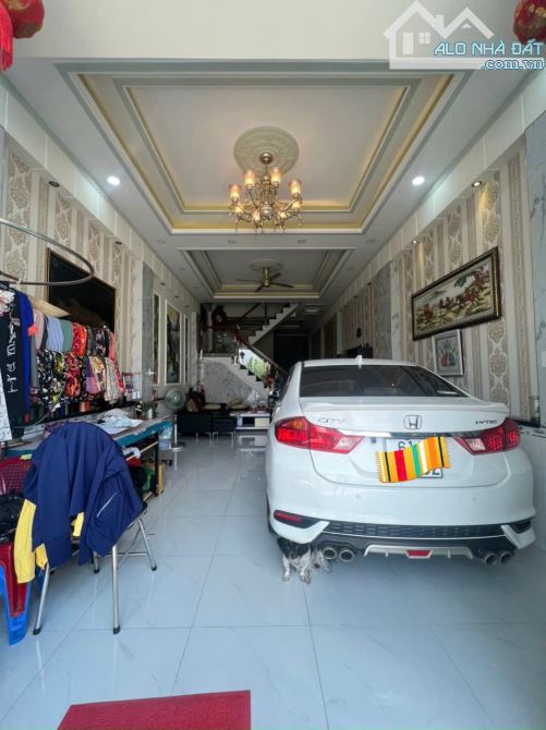 Bán nhà mới ĐẸP 3 Tầng Dĩ An,đường nhựa 13M,gần chợ Thông Dụng - 2