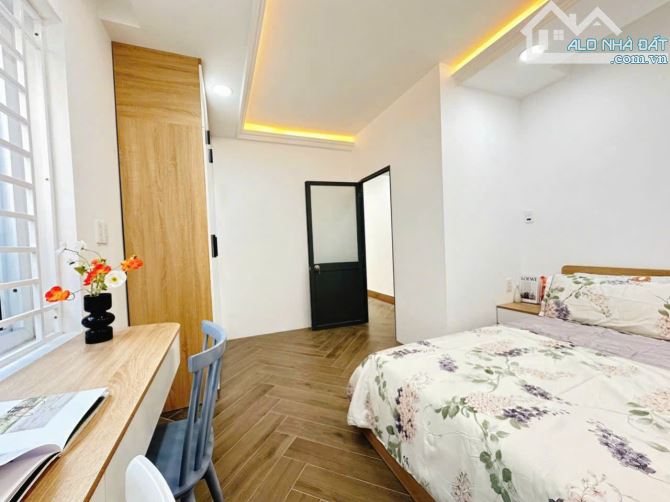 Bán Toà NHà CHDV MT ngay Quang Trung Gò Vấp 10x30m Hầm 7 tầng HĐT 160tr giá 37.5 tỷ. - 1
