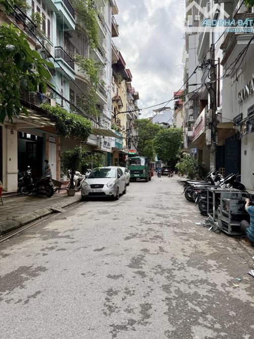 BÁN NHÀ TRUNG TÂM QUẬN ĐỐNG ĐA 7 TẦNG THANG MÁY KINH DOANH Ô TÔ TRÁNH 50M 21 TỶ - 2