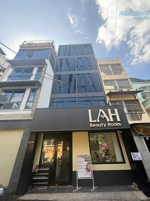Bán nhà Mặt Tiền đường Hoa Phan Xích Long DT:6x15m ,5 tầng ,HDT :55tr giá 20.5 tỷ tl
