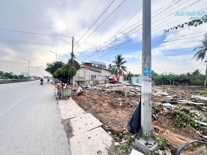 Bán 1.400 m2 đất có thổ cư mặt tiền đuờng QL1A,gần cầu Ruợu,xã Tam Hiệp Châu Thành - 2