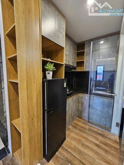 Tòa nhà 7 tầng Định Công, thang máy, 90m2, 16 phòng full nội thất cho thuê, 15.8 tỷ