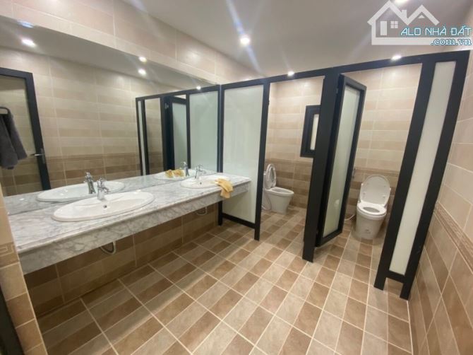 Tòa nhà VP mặt phố Thanh Xuân, 118 m2, 9 tầng, mt 8m, lô góc, chỉ 59.9 tỷ - 1