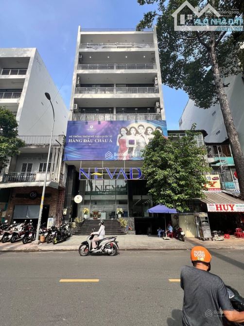 Tòa nhà mặt tiền Trần Bình Trọng,P.4 Quận 5: DT 200,8m2 (10x20m) hầm 7 tầng. HĐT 350tr/th