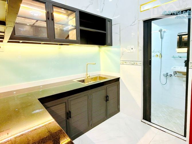 Bán nhà mới đẹp 2 lầu sân thượng hẻm Âu Dương Lân, Quận 8 - 1