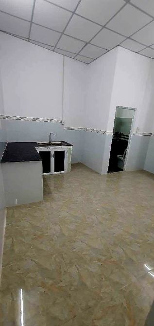 BÁN NHÀ-QUẬN 12 LÊ THỊ RIÊNG,Cấp 4 DT 58M2 ,KC 4x15M, GIÁ 2,25 TỶ - 2