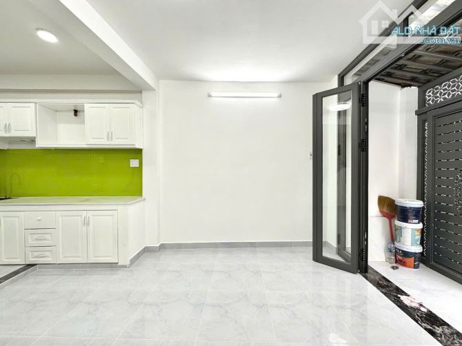 Nhà 4 tầng 4x8m 3PN 4WC 486/8 Lê Quang Định 5.59 ty - 4