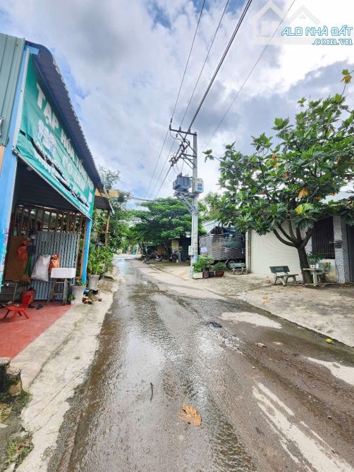 nhà 151,9m2 3ty7 TL cấp 4 MT đường Trương Văn Vĩnh P.Tân Bình Tp Dĩ An - 1