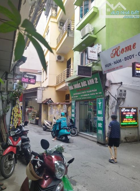 NHỈNH 11 TỶ NHÀ LÔ GÓC TRẦN THÁI TÔNG, CẦU GIẤY, KINH DOANH, DT 30M, 6 TẦNG, MT 3.5M - 1
