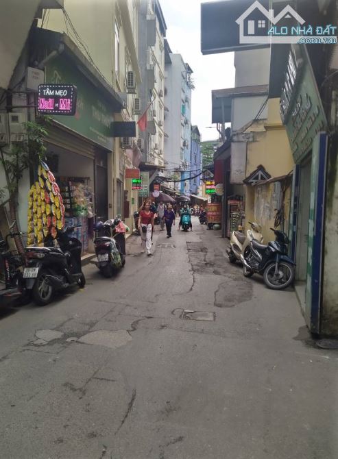 NHỈNH 11 TỶ NHÀ LÔ GÓC TRẦN THÁI TÔNG, CẦU GIẤY, KINH DOANH, DT 30M, 6 TẦNG, MT 3.5M - 2
