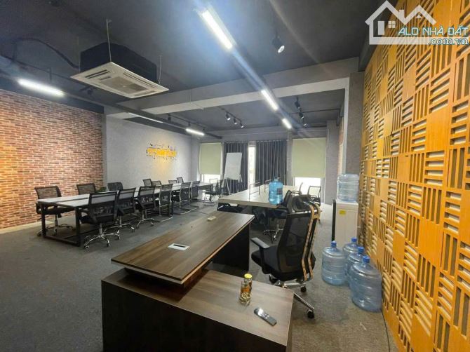 Bán gấp MT Đinh Thị Thi, DT 147m2 + 5 tầng thang máy, đã có sổ hồng giá bán 40 tỷ TL - 5
