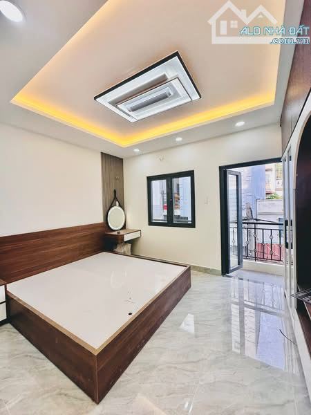 Nhà mới TT Q7 . Võ thị nhờ . Dt 4x13m 1 lầu 3pn - 9