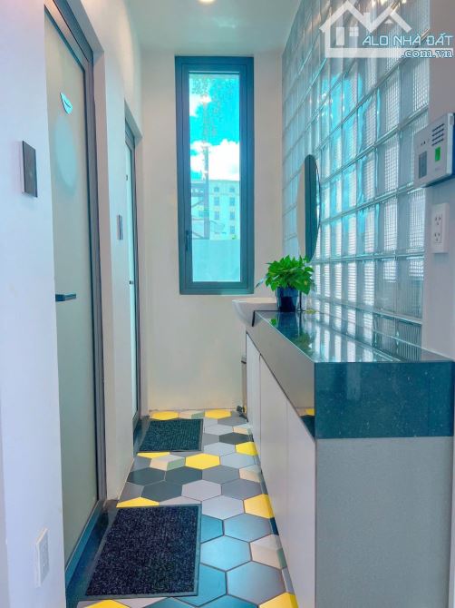 Tòa nhà VP mới xây Mặt tiền LK Phan Đăng Lưu gần 1000m2 sàn HĐT 2,64 Tỷ/n Hầm 7 tầng ST - 8