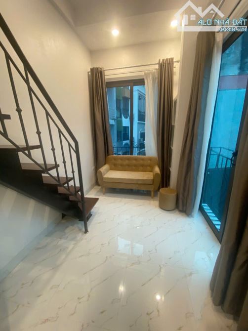 Cho Thuê CCMN 166 Trần Duy Hưng Cầu Giấy 25m2 Gác Xép 2 Ban Công Thang Máy Sofa Ô Tô Con - 11