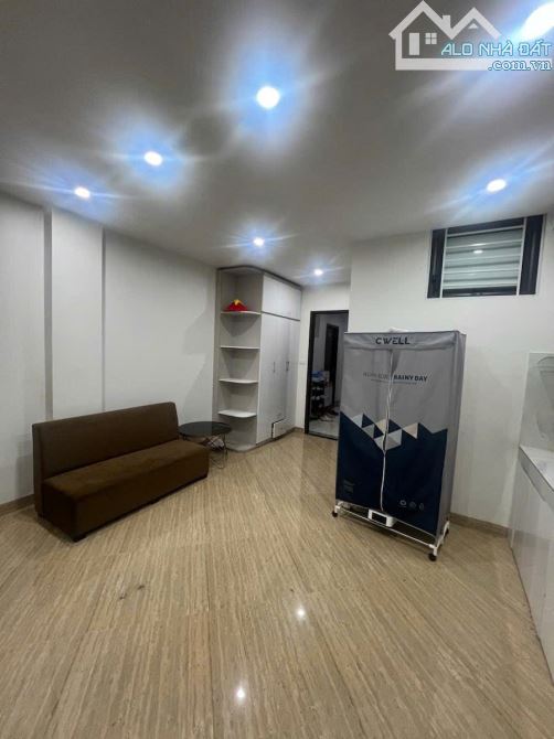TÒA NHÀ CHDV HÀO NAM - ĐỐNG ĐA - DT 111M2 x 8T- 23,9 TỶ-GẦN PHỐ-20 PHÒNG-DT 30 TR/TH - 2