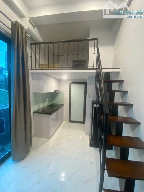 Cho Thuê CCMN 166 Trần Duy Hưng Cầu Giấy 25m2 Gác Xép 2 Ban Công Thang Máy Sofa Ô Tô Con - 4