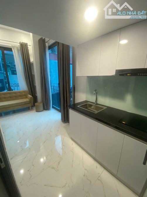 Cho Thuê CCMN 166 Trần Duy Hưng Cầu Giấy 25m2 Gác Xép 2 Ban Công Thang Máy Sofa Ô Tô Con - 7