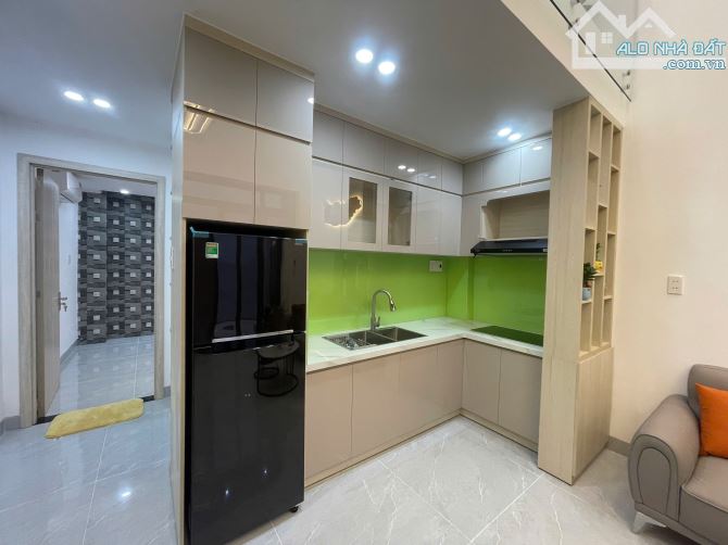 BÁN NHÀ 2 TẦNG MỚI TINH - CẠNH PHỐ HUỲNH NGỌC HUỆ - FULL NỘI THẤT XỊN SÒ, XÁCH VALI VÀO Ở